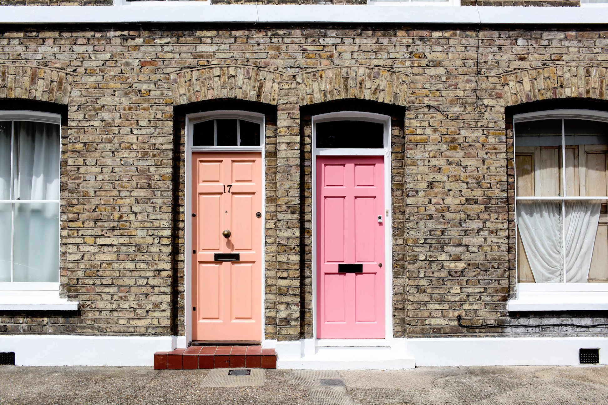 photo of a pink and peach front door