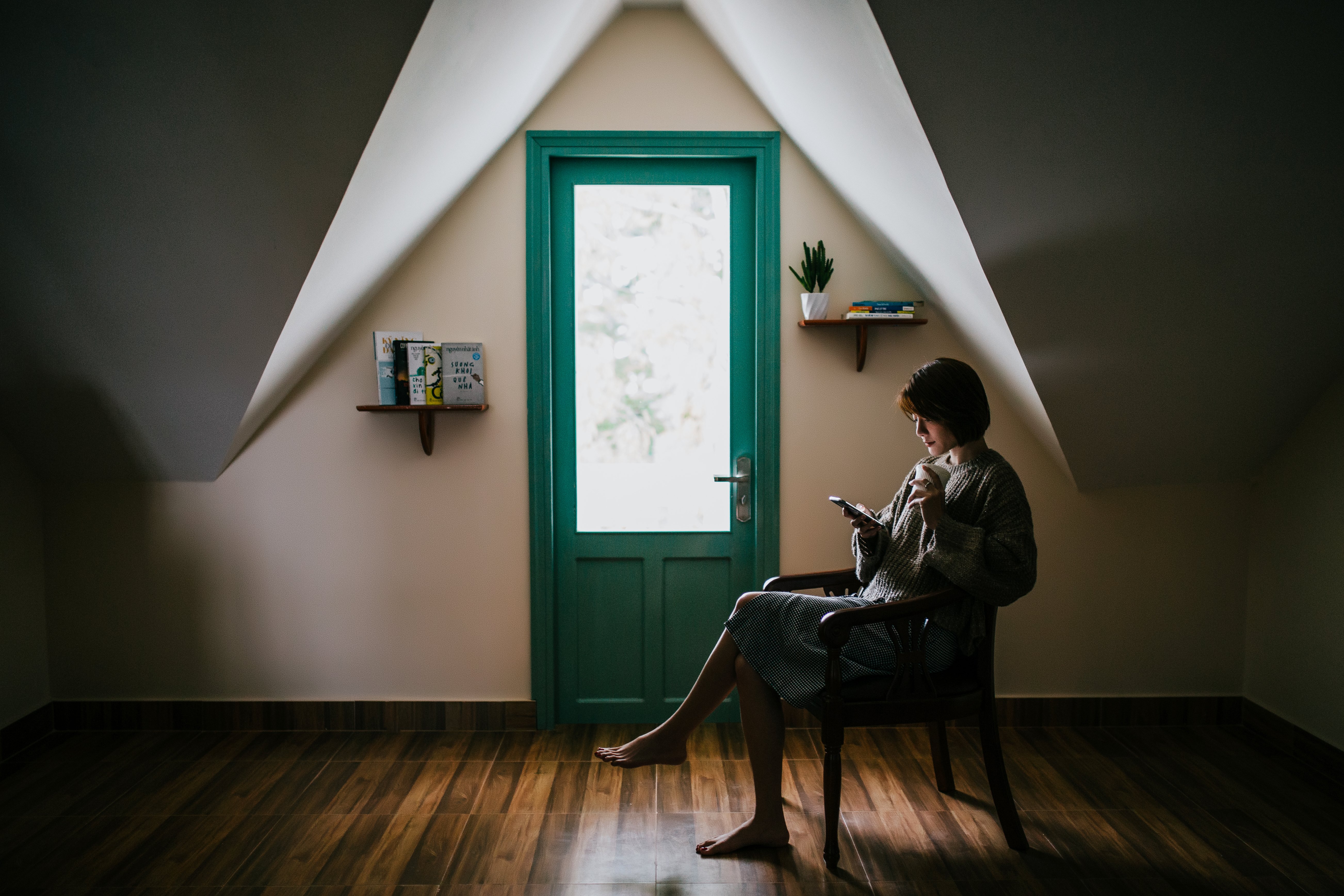 photo of woman near door